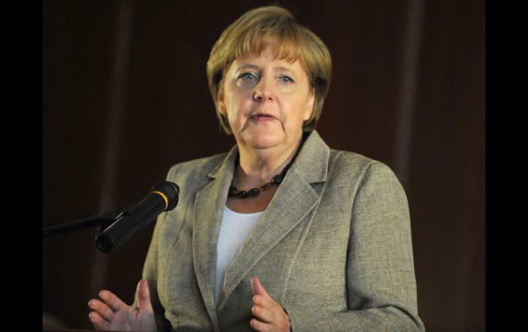 Angela Merkel había comprometido su presencia en la final, junto con el presidente alemán, Christian Wulff. AFP  /