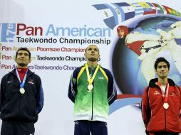 Guillermo Perez y Marcio Ferreira (C) durante el Panamericano de Taekwondo 2010 en Monterrey. MEXSPORT  /