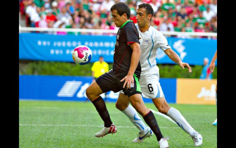 El equipo tricolor durante su encuentro con los uruguayos. MEXSPORT  /