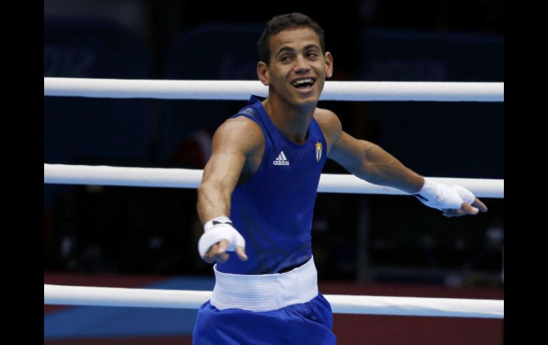 El boxeador caribeño, feliz luego del veredicto favorable. REUTERS  /