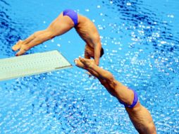 La dupla suma tres medallas de bronce en los 3 metros sincronizados. ARCHIVO /