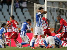 Los jugadores del Granada celebran el gol de empate ante la Real Sociedad. EFE /