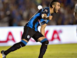 Mario Humberto Osuna celebra el primer gol a favor de Querétaro. MEXSPORT / O. Aguilar