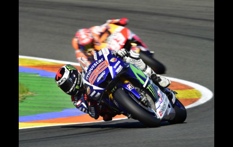 Lorenzo cruzó la meta por delante de Márquez y Pedrosa. AFP / J. Soriano