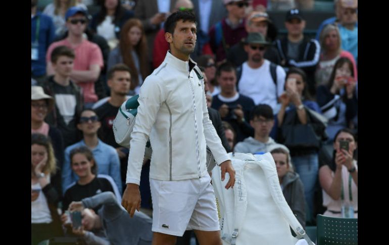 La retirada de Djokovic permite al británico Andy Murray seguir al frente de la lista ATP el próximo lunes. AFP / G. Kirk