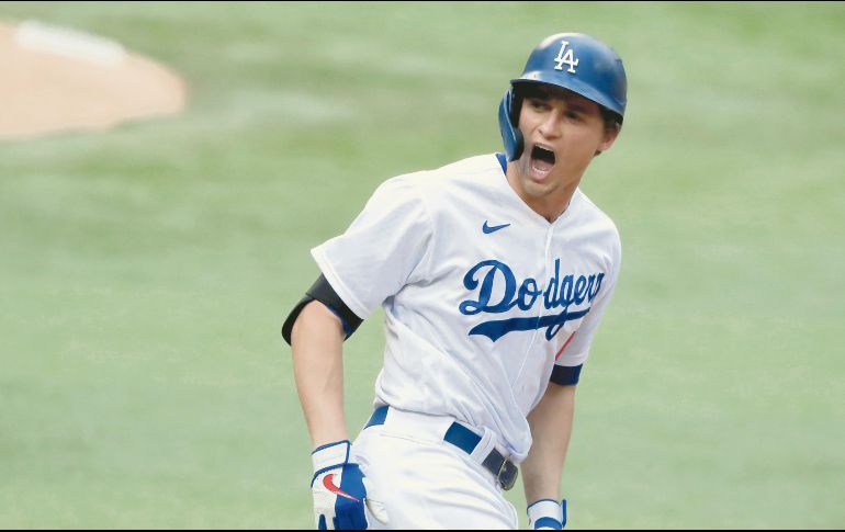 TALISMÁN. Corey Seager conectó un cuadrangular solitario en la primera entrada y lució a la defensiva para que el campeón de la Liga Nacional se defina hoy. AP • C. Compton