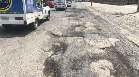 Lamentan que, aunque se anunció una inversión de 48 millones 700 mil pesos, hasta la fecha persisten los baches. ESPECIAL