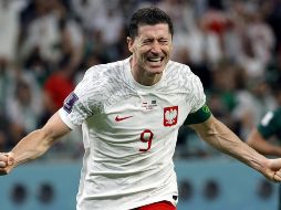 Robert Lewandowski celebra el primer gol que anotó en una Copa del Mundo. EFE / R. Wittek