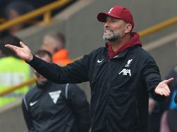 JURGEN KLOPP. La victoria hubiera dejado a Liverpool como líder, por encima del actual campeón Manchester City. AFP / ARCHIVO