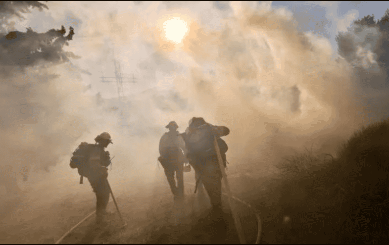 Según el Centro Nacional Interagencial de Bomberos,  no se prevé que haya una contención total sino hasta el 15 de julio. XINHUA/ARCHIVO