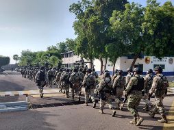 Los elementos arribaron al Aeropuerto Internacional de Culiacán en dos aeronaves, una de la Guardia Nacional y otra de la Fuerza Aérea Mexicana. EFE / SEDENA