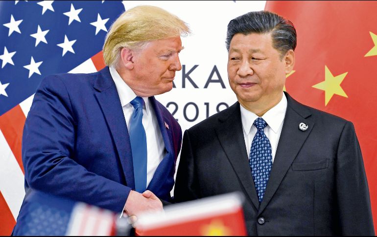 El presidente de EU y su homólogo chino, en su última reunión en la cumbre del G20 en Osaka, Japón, en 2019. AP