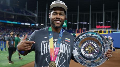 En la final, García impulsó la primera carrera del juego. AFP