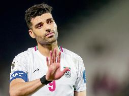 Mehdi Raremi. El delantero iraní y el resto de sus compañeros de Selección siguen en medio de una encrucijada de cara al Mundial. AFP