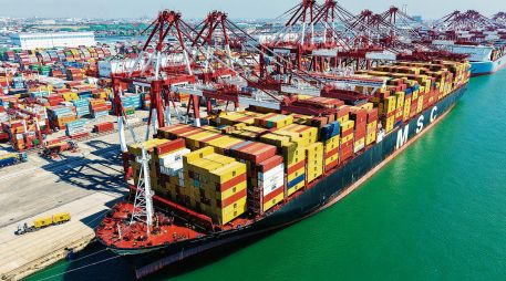 El comercio de exportación entre México y Estados Unidos mantiene actividad constante mientras avanzan las negociaciones para la revisión del T-MEC. AFP