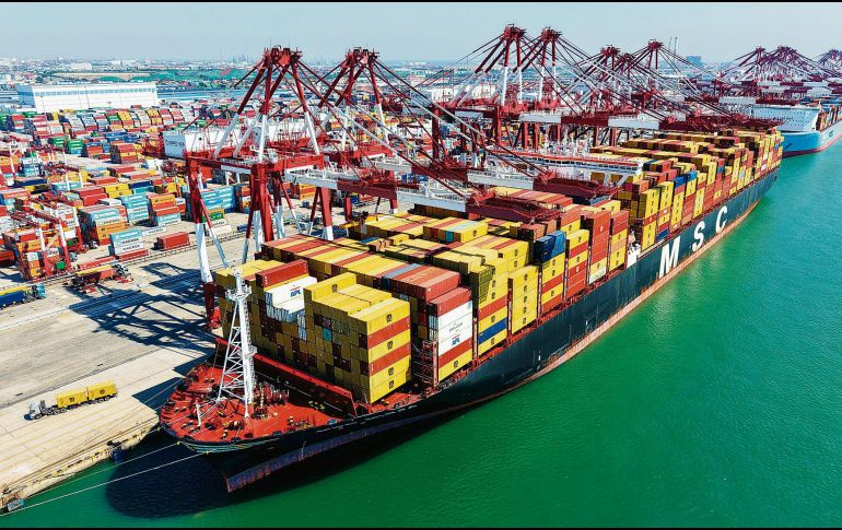 El comercio de exportación entre México y Estados Unidos mantiene actividad constante mientras avanzan las negociaciones para la revisión del T-MEC. AFP