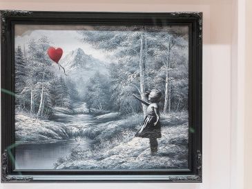 La obra de Banksy fue vendida por 17.9 millones de dólares, en Nueva York. EFE