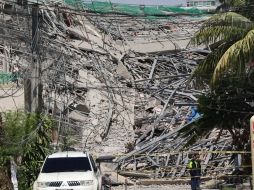 La tragedia ocurrió en una estructura de hormigón de nueve pisos aún sin terminar. AP