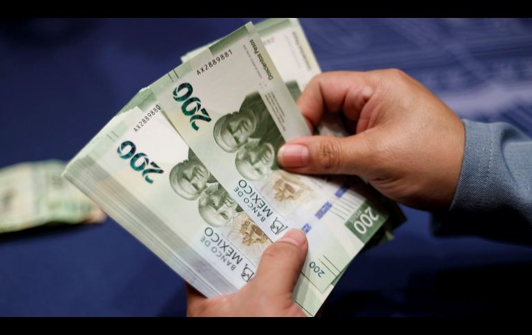El tipo de cambio tocó un máximo de 17.54 pesos por dólar el 5 de mayo y un mínimo de 17.16 pesos por dólar el 11 de mayo. EFE/ARCHIVO