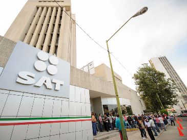Muchos contribuyentes se preguntan qué pasará con las operaciones del SAT en estos días de gran actividad deportiva. EL INFORMADOR/ARCHIVO