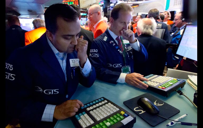 La Bolsa de Nueva York retrocedió después de que la Fed anunciara que no modifica los tipos de interés. AP/ARCHIVO