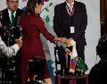 Aunque Merlín causó furor con su aparición al lado de Claudia Sheinbaum, las críticas no faltaron. AP/M. Ugarte