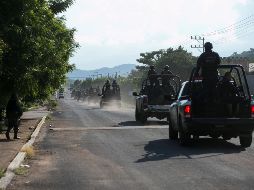 Los pistoleros formaban parte de un grupo de al menos 12 sicarios que fue descubierto por los guardias nacionales en Jujutacato. EFE/ARCHIVO