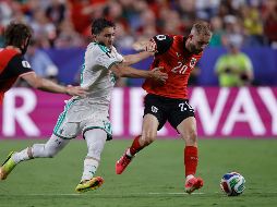 Un gol en el tiempo de compensación aseguró la clasificación de Austria y Argelia a la fase de eliminación directa. EFE.