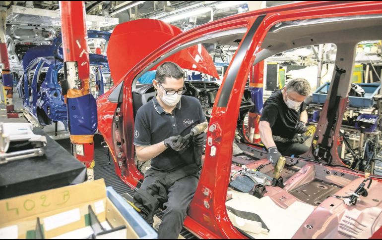 Industria automotriz. Una de las más beneficiadas por el T-MEC. EFE/S. Courdji