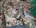 Vista aérea tomada con un dron el 17 de julio de 2026 del sitio de un derrumbe de una montaña provocado por las lluvias a lo largo de una sección del río Wujiang, en la municipalidad de Chongqing, en el suroeste de China. Xinhua/H. Wei