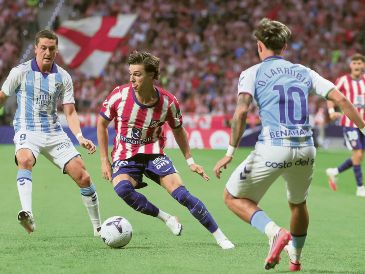 Los Colchoneros aseguraron los primeros tres puntos de la campaña con la victoria ante el Málaga. EFE