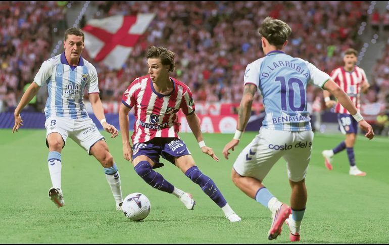 Los Colchoneros aseguraron los primeros tres puntos de la campaña con la victoria ante el Málaga. EFE