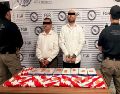 Las autoridades encontraron 10 paquetes con un peso total de 10 kilogramos de fentanilo y otros ocho con ocho kilogramos de heroína, además de varios dispositivos móviles. ESPECIAL/Gabinete de Seguridad