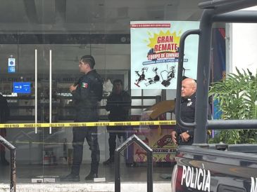 Los hechos ocurrieron en un negocio ubicado en los cruces de la Calle Xóchitl y Paseo de los Laureles. ESPECIAL/Policía de Zapopan