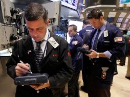Las ganancias de este viernes no fueron suficientes para cubrir las constantes pérdidas en la Bolsa de Nueva York. AP/ARCHIVO