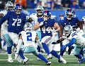 La ofensiva neoyorquina dominó el tiempo de posesión y capitalizó los errores del rival para asegurar la victoria en este duelo divisional de la NFC Este. AFP.