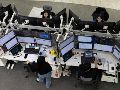 Por sectores, las mayores ganancias fueron para las empresas de salud y bienes raíces; las únicas que cerraron en rojo fueron las de comunicaciones y tecnología. EFE/J. HEON-KYUN