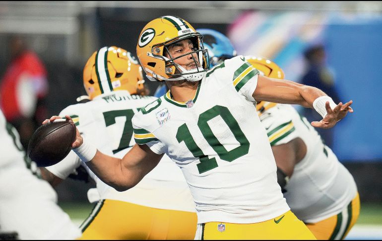 Jordan Love. El quarterback lanzó tres pases de anotación y acumuló 288 yardas para conducir la victoria de Green Bay. AP